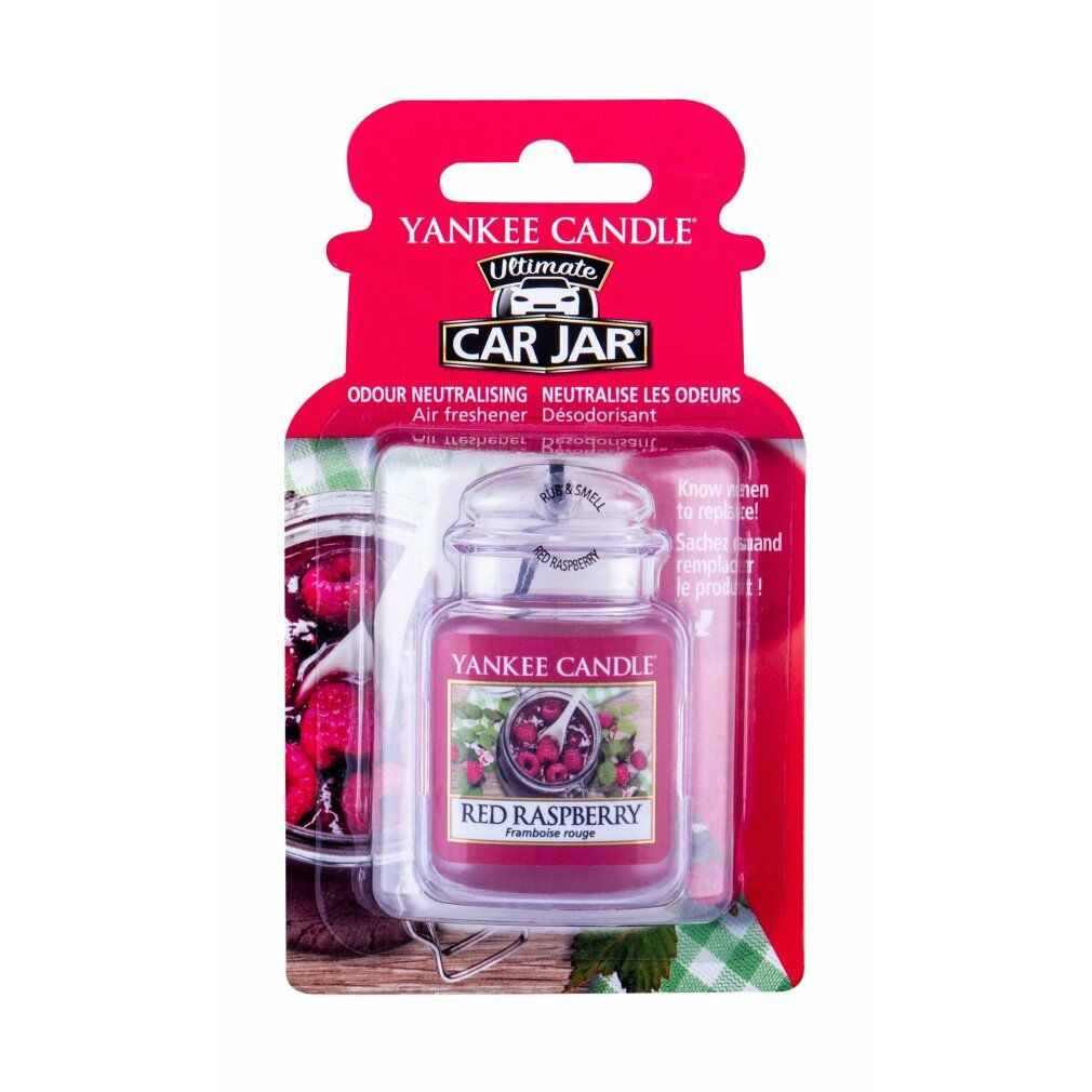 Roter Himbeere Ultimate Car Jar. Rotes Glas mit Deckel, Etikett mit Himbeeren. Verpackung mit Aufhängeloch. Text: Yankee Candle, Red Raspberry.
