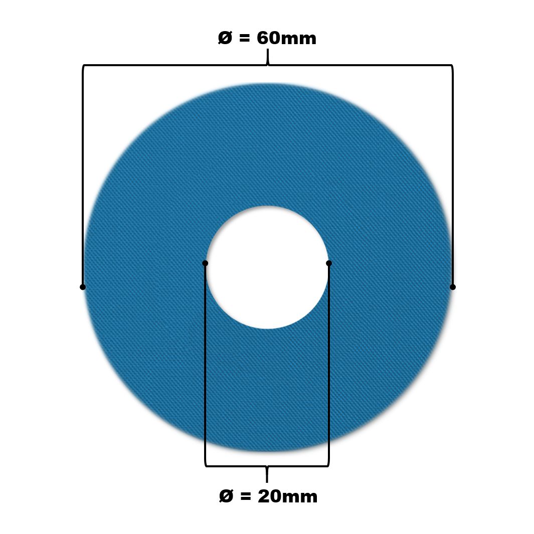 Blauer, kreisförmiger Katheterpatch mit zentralem Loch. Durchmesser 60mm, Loch 20mm.