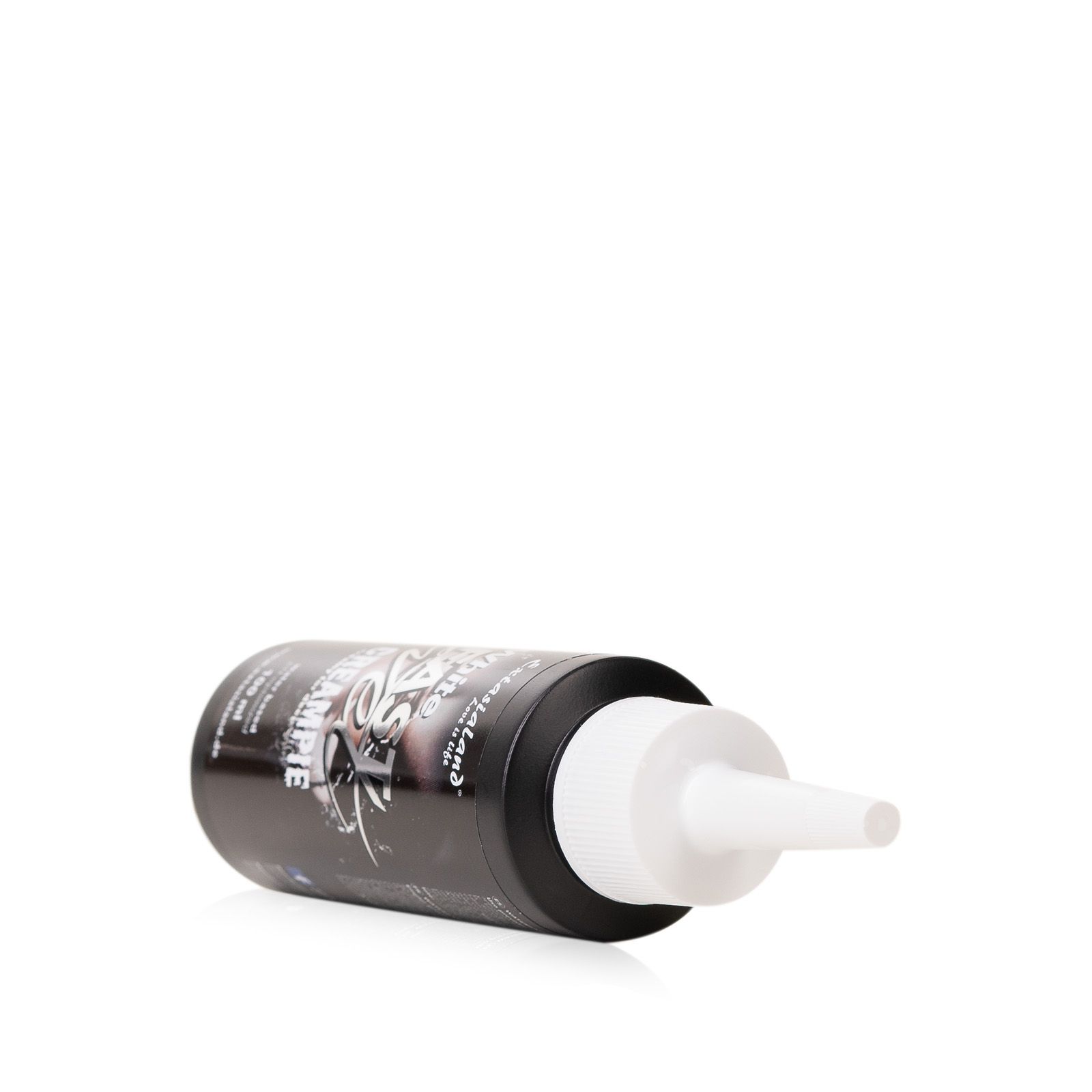 Flasche "White Fast Wet Creampie" liegt. Weißer Applikator. Marke Extasialand.