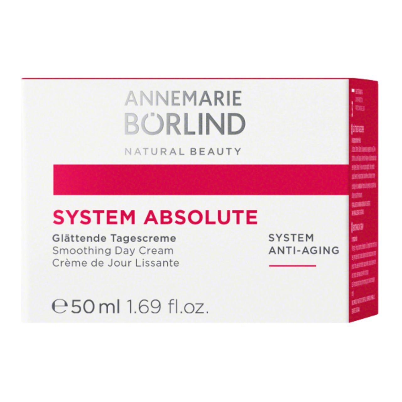 Weiße Schachtel mit rotem Streifen. Aufschrift: ANNEMARIE BÖRLIND, SYSTEM ABSOLUTE, Glättende Tagescreme, 50ml.
