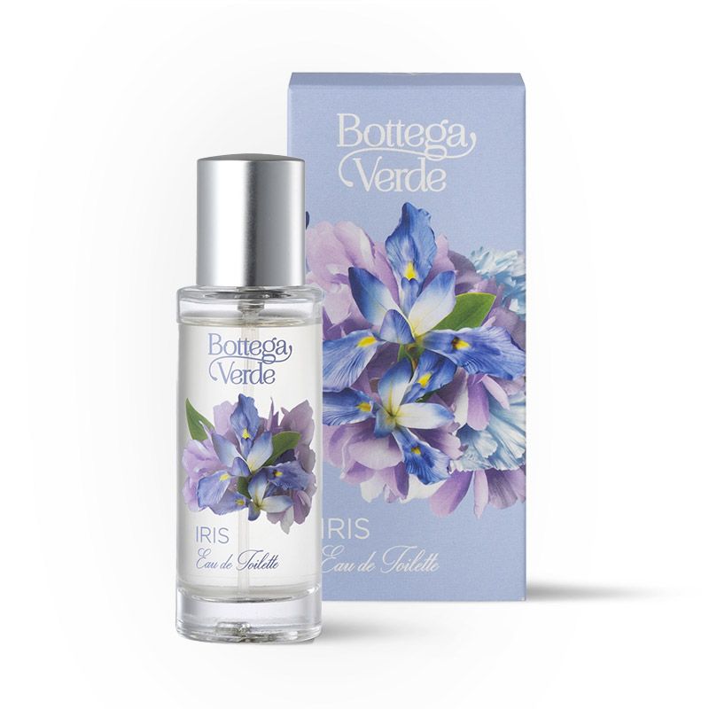 Flacone di Eau de toilette Iris di Bottega Verde, accanto alla confezione. Il flacone trasparente ha un tappo argentato. Un motivo floreale di iris è presente sul flacone e sulla confezione. Il testo recita: Bottega Verde, Iris, Eau de Toilette.