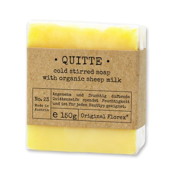 Gelbe Seife mit Papierbanderole. Aufschrift: Quitte, cold stirred soap, Original Florex, e 150g.