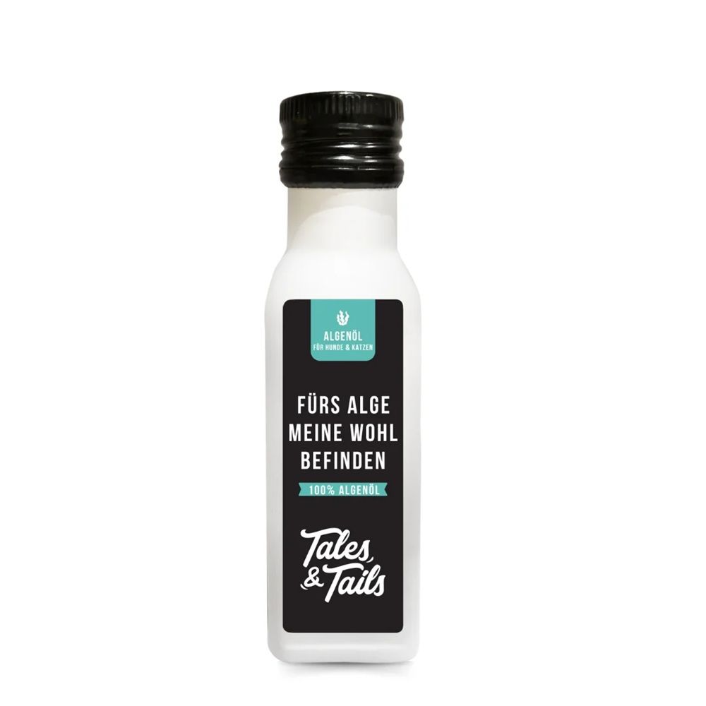 Weiße Flasche mit schwarzem Schraubverschluss. Etikett mit Text: Fürs Alge Meine Wohlbefinden, 100% Algenöl. Logo und Schriftzug Tales & Tails.