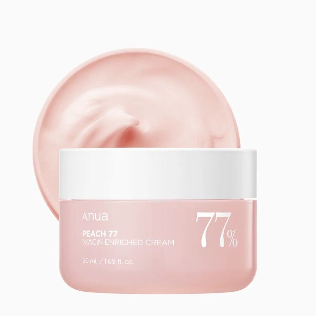 ANUA Peach 77% Niacin Enriched Cream mit einer cremigen Textur, die aus dem Tiegel herausragt.