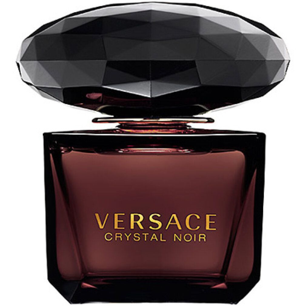 Versace Crystal Noir Flakon. Schwarzer, facettierter Deckel. Brauner Flakon mit Aufschrift: Versace Crystal Noir.
