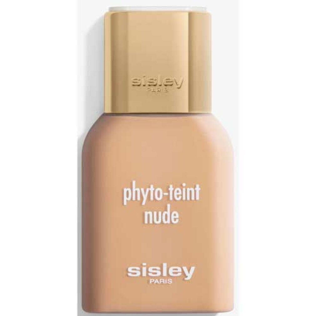 Beige Flasche mit goldfarbenem Deckel. Aufschrift: Phyto-Teint Nude und Sisley Paris.