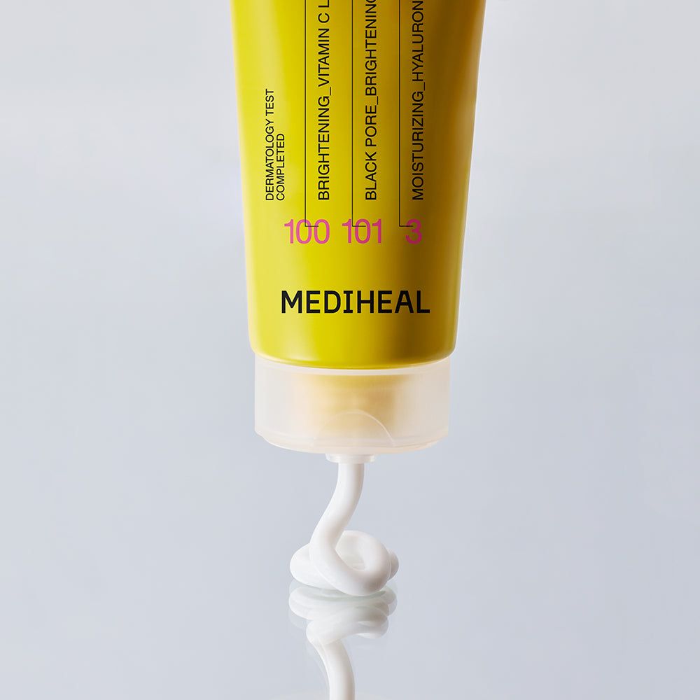 Gelbe Tube mit MEDIHEAL-Logo und weißer Creme, die herausfließt. Enthält Text zu Vitamin C und Hyaluron.