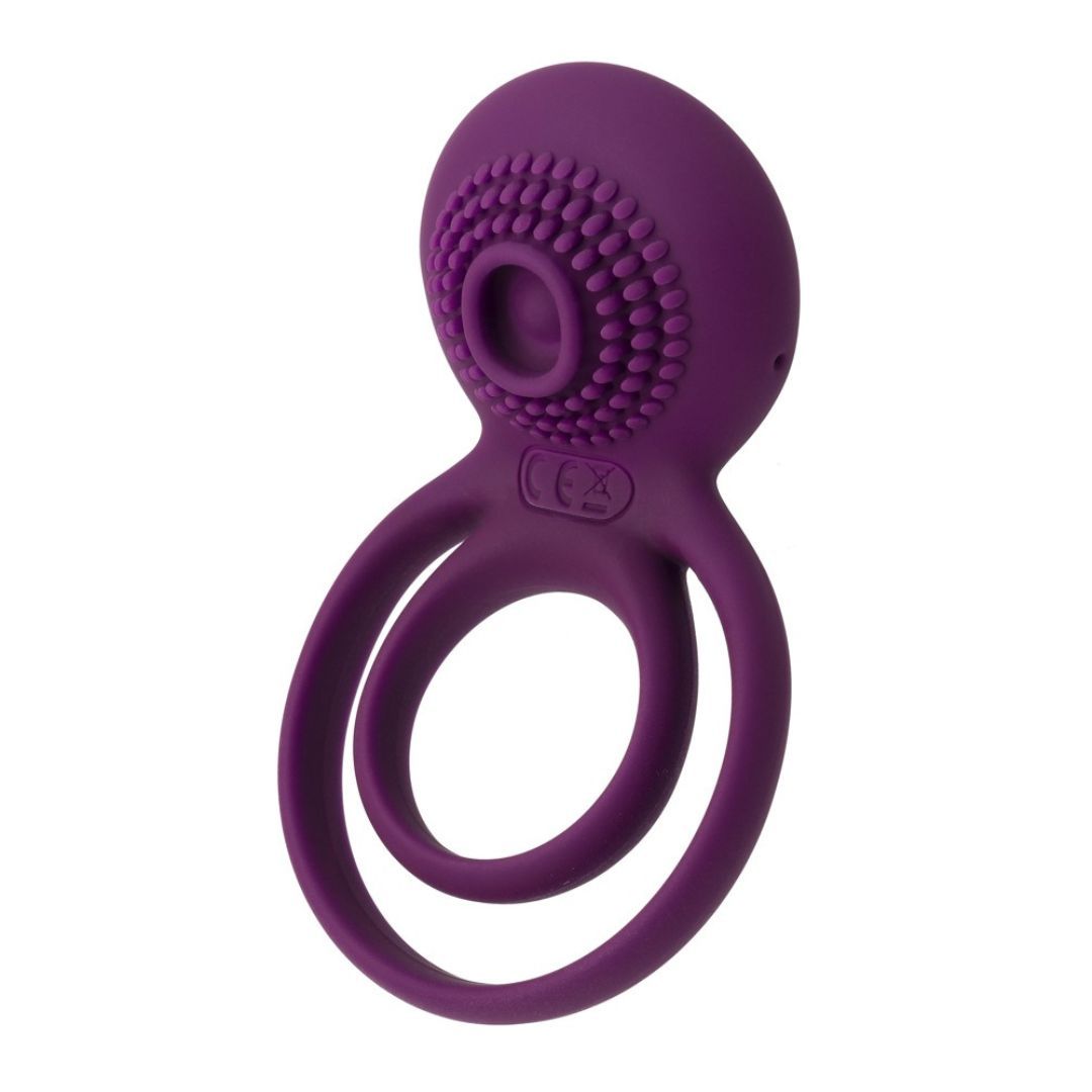 Lila Ringvibrator mit zwei Ringen und einem strukturierten Kopf. CE-Kennzeichnung sichtbar.