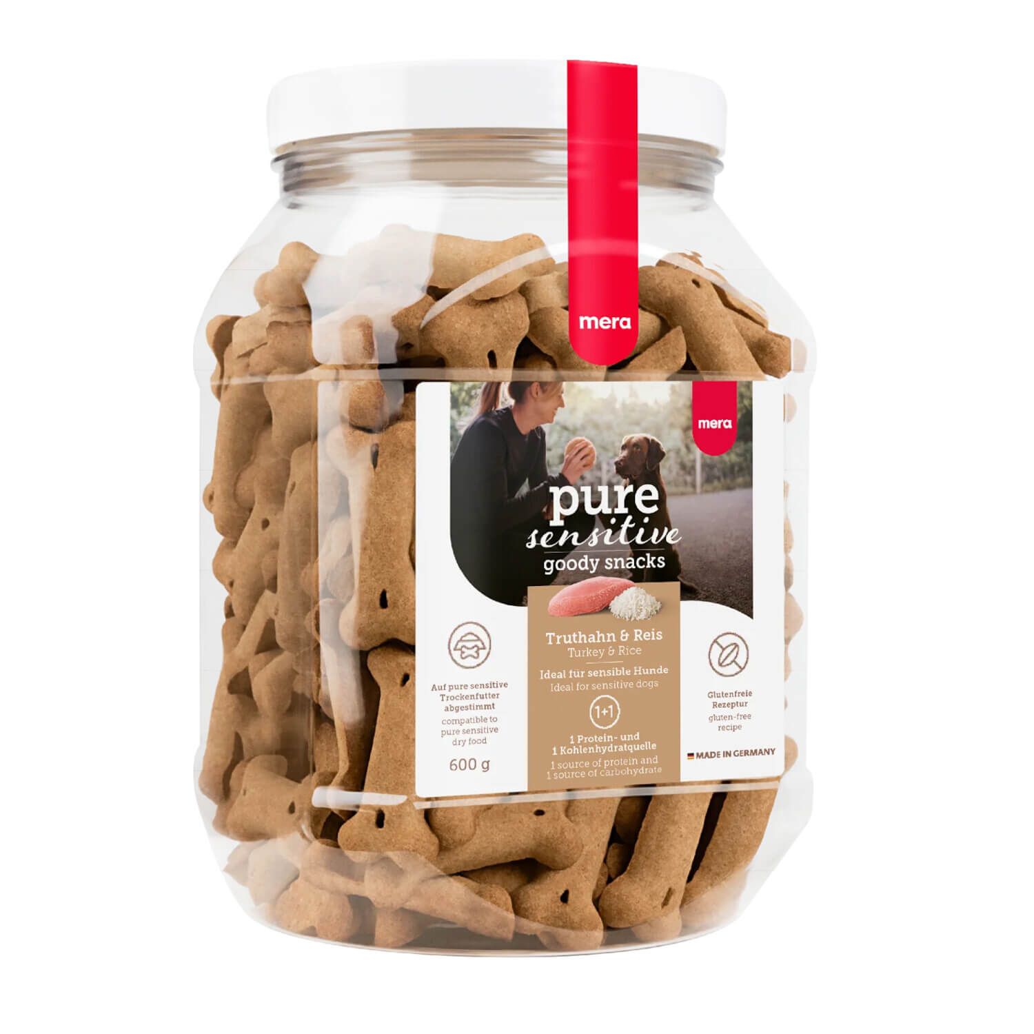 Transparenter Behälter mit Hundesnacks. Aufkleber mit Produktnamen und Logo. Roter Verschluss.