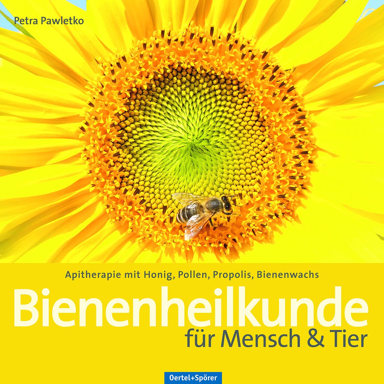 Buchcover mit Sonnenblume, Biene. Titel: Bienenheilkunde für Mensch & Tier. Autorin: Petra Pawletko. Verlag: Oertel+Spörer.