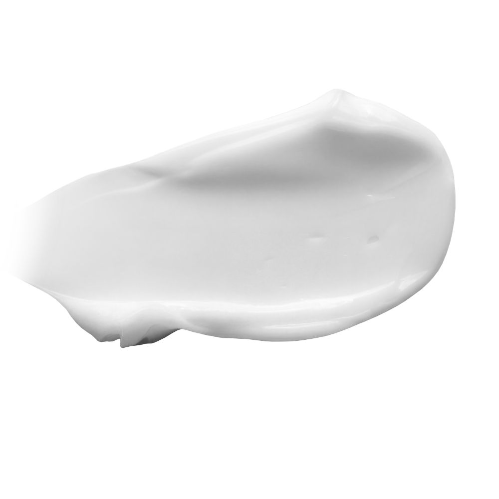 Ein weißer Tupfer Lotion auf weißem Hintergrund.