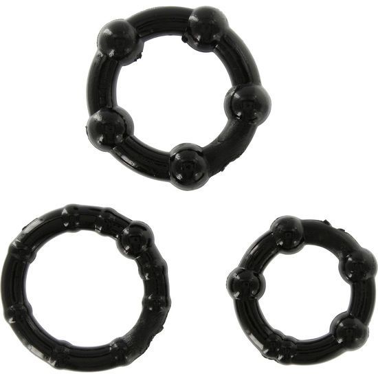 Drei schwarze Ringe mit Noppen, auf weißem Hintergrund.