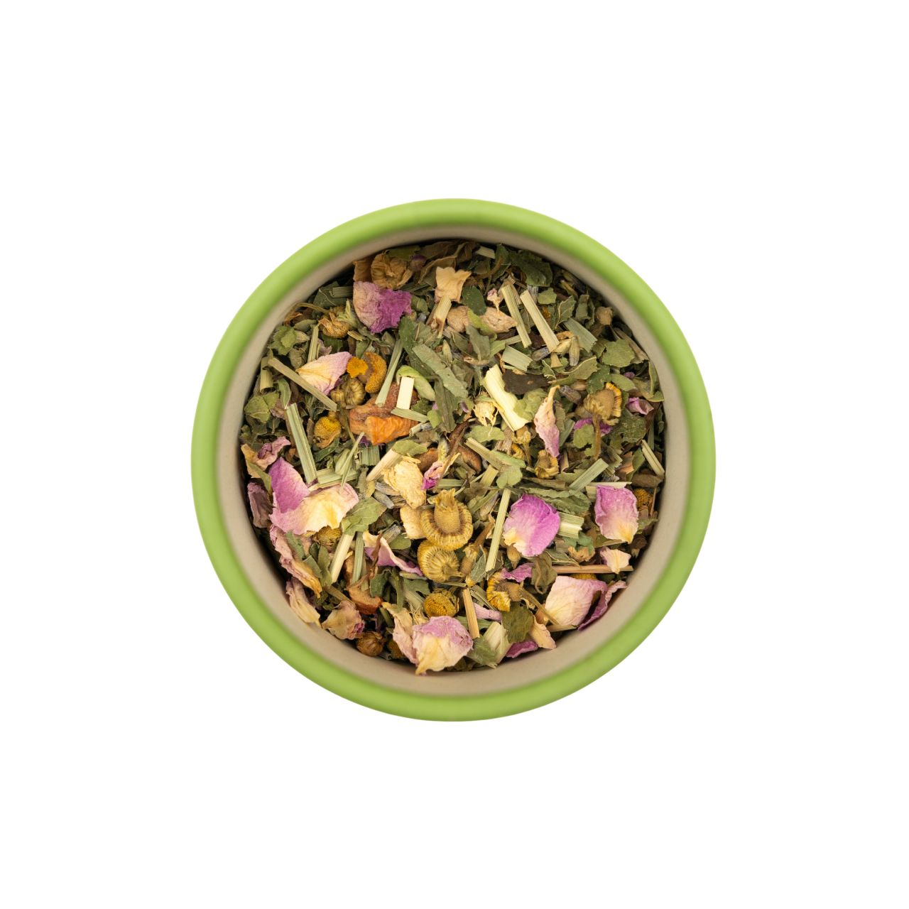 Grüner Behälter mit Kräutermischung. Sichtbar: Blütenblätter, Kräuter.