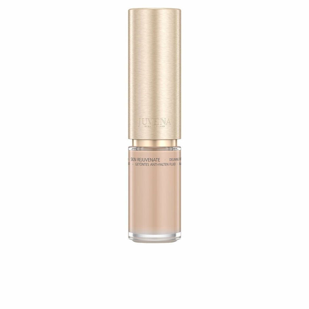 Flakon Juvena of Switzerland Delining Tinted Fluid SPF 10. Beige Flüssigkeit, goldener Deckel.