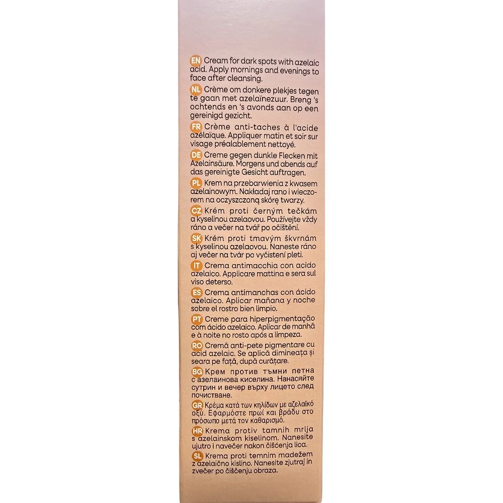 Rosa Schachtel mit mehrsprachigem Text. Enthält Informationen zur Anwendung und Inhaltsstoffen des Produkts.