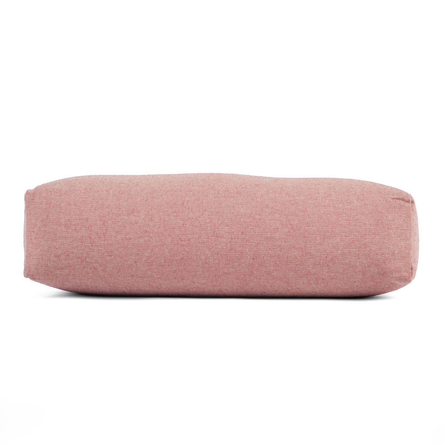 Yoga-Bolster, rosa. Zylindrische Form, Stoffbezug. Für Yoga-Übungen.