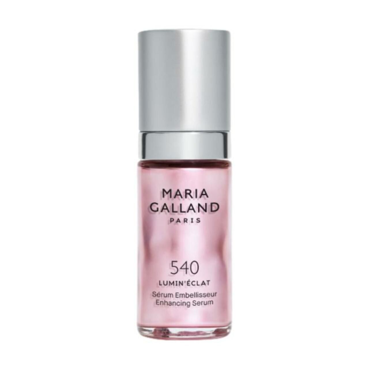 Rosa Flasche mit silbernem Deckel. Beschriftung: Maria Galland Paris, 540 LUMIN'ÉCLAT, Sérum Embellisseur, Enhancing Serum.