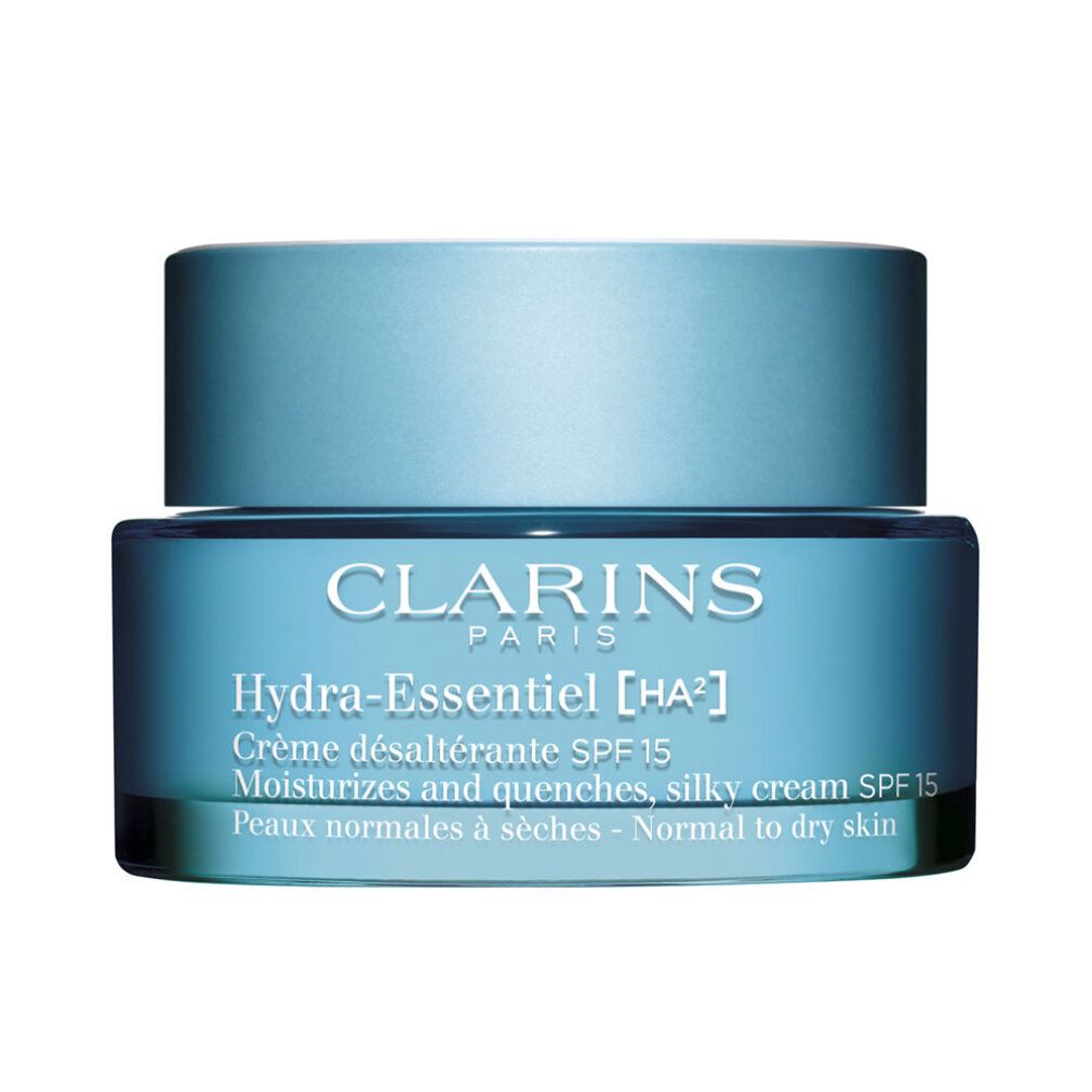 Blaues Tiegel mit Deckel. Aufschrift: Clarins Paris, Hydra-Essentiel, Crème désaltérante SPF 15. Für normale bis trockene Haut.