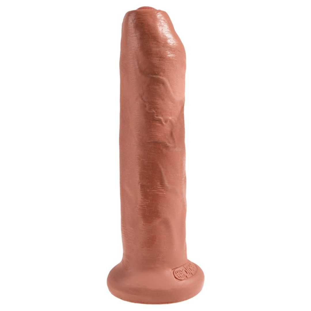 Dildo aus braunem Material. Basis und Spitze abgerundet. Oberfläche strukturiert.