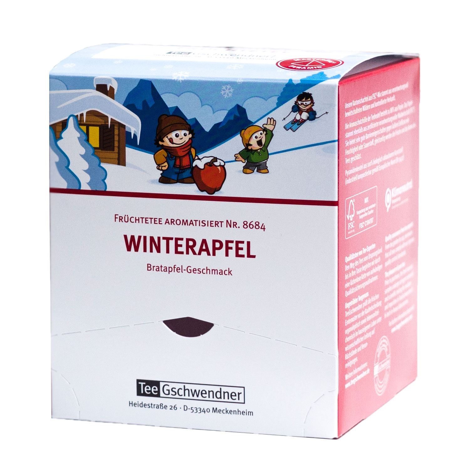 Karton mit Aufdruck. Text: Winterapfel, Tee Gschwendner. Illustration: Kinder, Apfel, Winterlandschaft. Rote und weiße Verpackung.