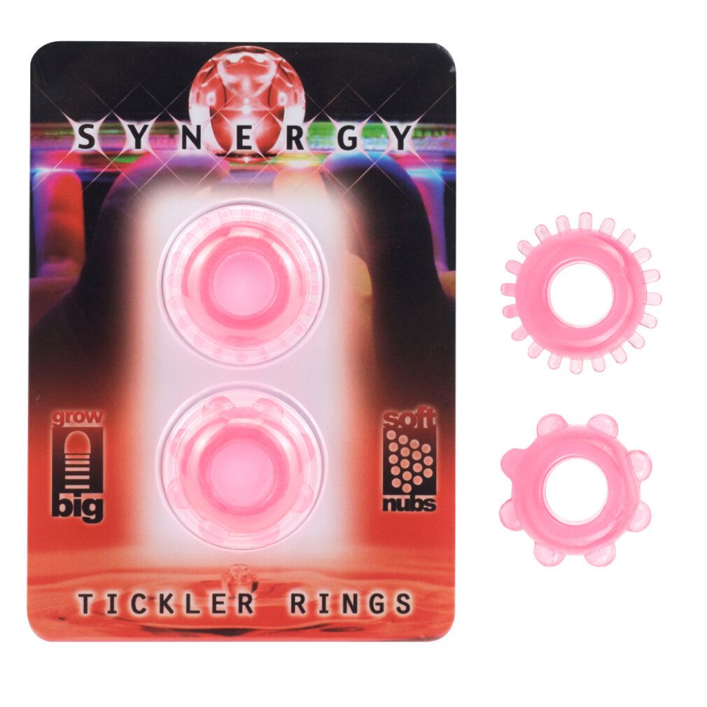 Zwei rosa Tickler Rings und Verpackung. Auf der Verpackung: SYNERGY, Tickler Rings, grow big, soft nubs.