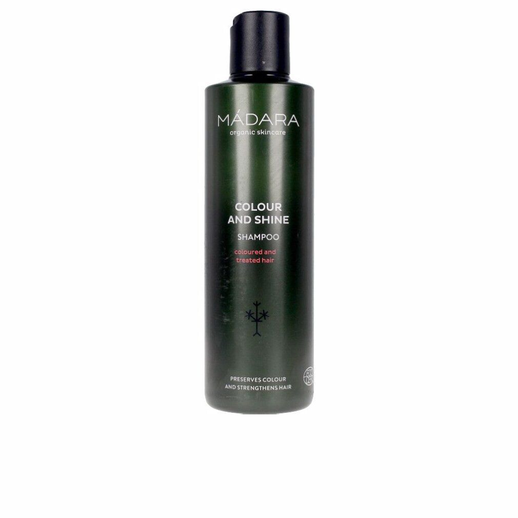 Grüne Flasche mit schwarzem Deckel. Aufschrift: MÁDARA, Colour and Shine Shampoo. Für coloriertes Haar.