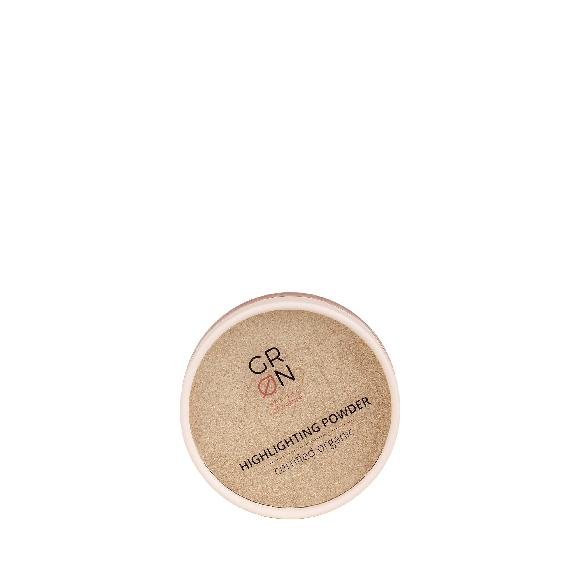 Runder Behälter mit goldenem Highlighting Powder. Aufschrift: GRN [GRÜN] Highlighting Powder, zertifiziert biologisch.