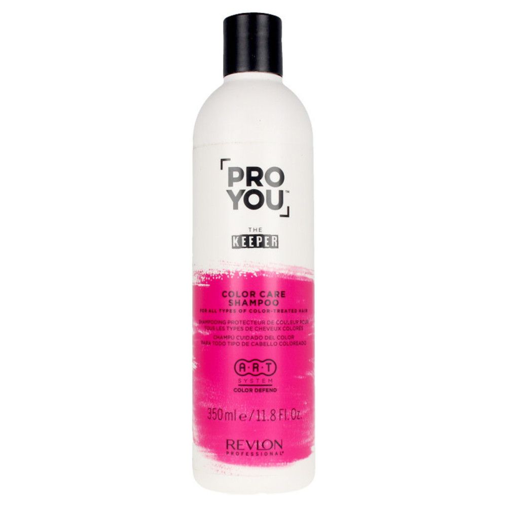 Weiße Flasche mit schwarzem Deckel. Aufschrift: PRO YOU THE KEEPER COLOR CARE SHAMPOO. Rosa Farbband. Revlon Professional.