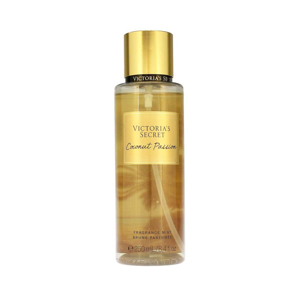 Victoria's Secret Körperspray mit goldenem Verschluss und Etikett, auf weißem Hintergrund.