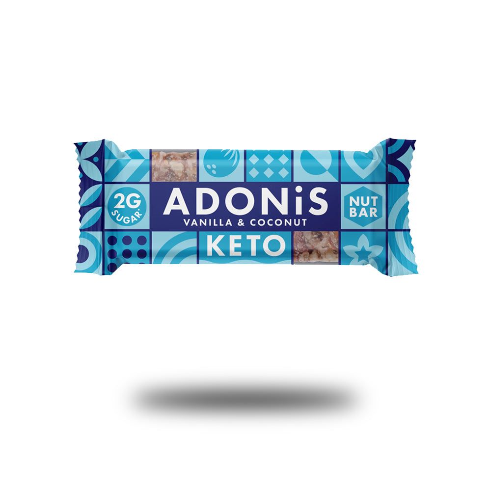 Keto-Proteinriegel mit blauer Verpackung. Aufschrift: ADONiS, Vanille & Kokos, KETO, 2G Zucker, Nut Bar.