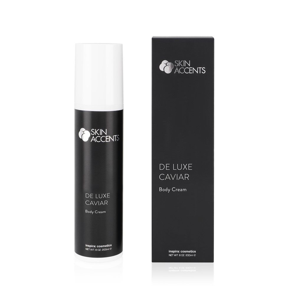 Schwarze Flasche und Schachtel mit Produktaufschrift. Aufschrift: Skin Accents, De Luxe Caviar Body Cream.