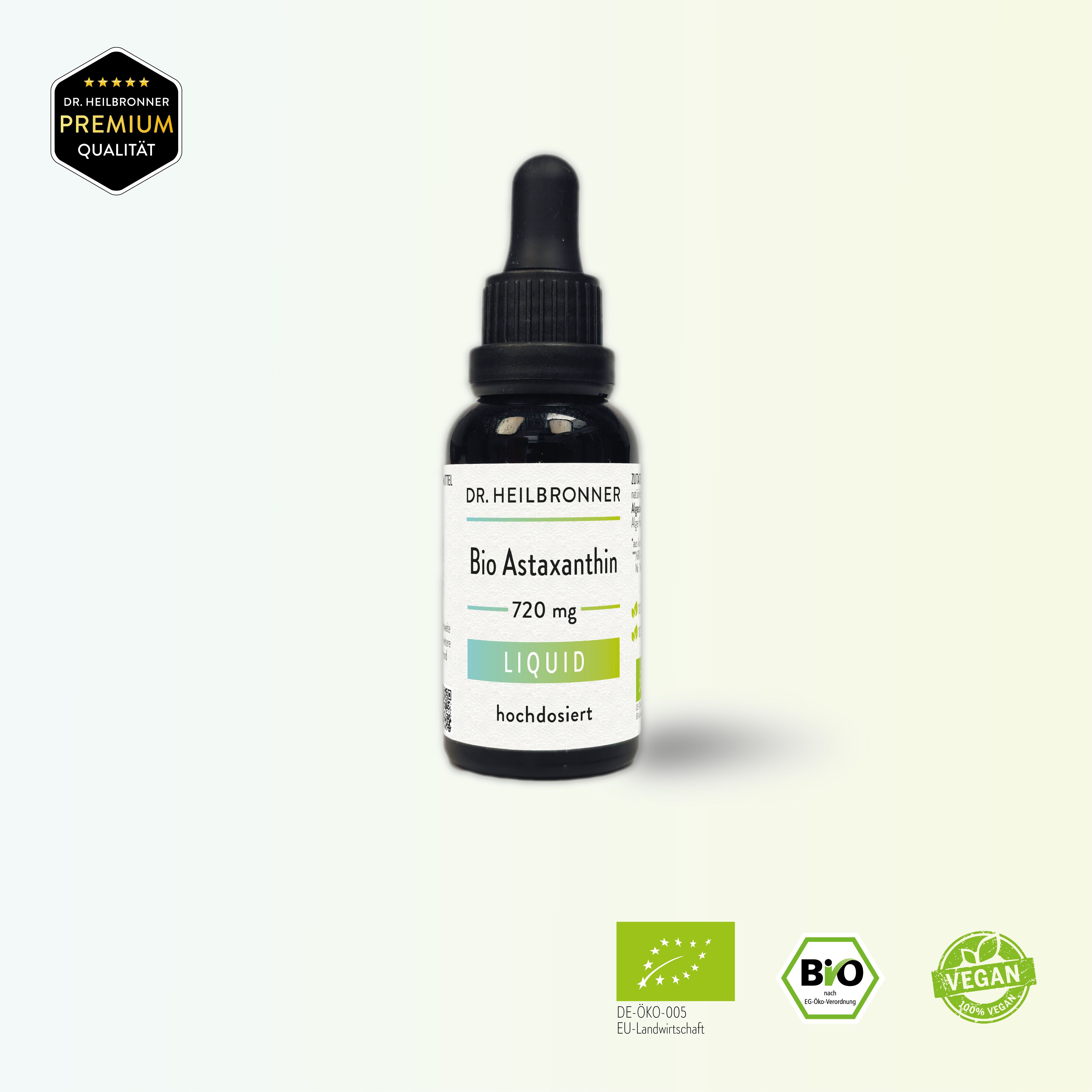 Braune Glasflasche mit schwarzem Tropfer. Beschriftung: Bio Astaxanthin Liquid, 720 mg, hochdosiert. Bio-Siegel, Vegan-Siegel.