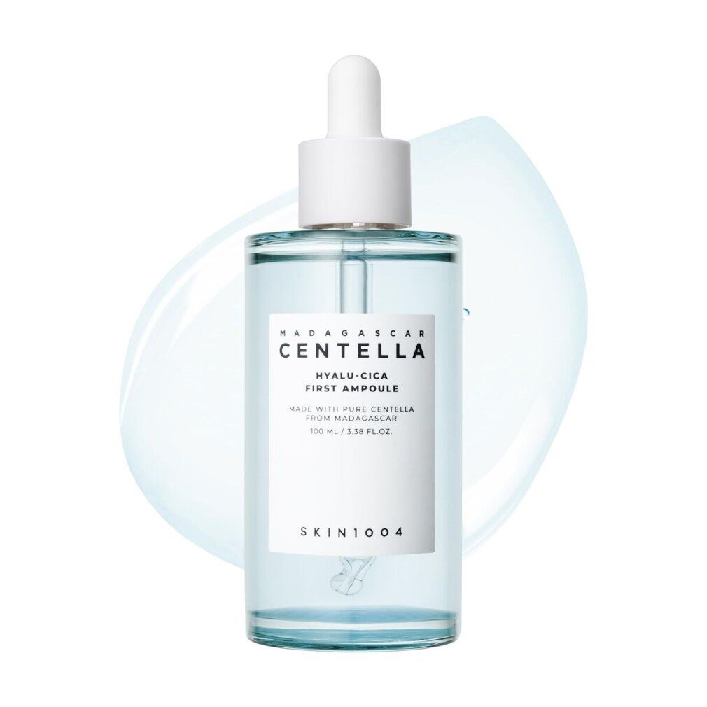 Flasche des Serums mit Pipette.