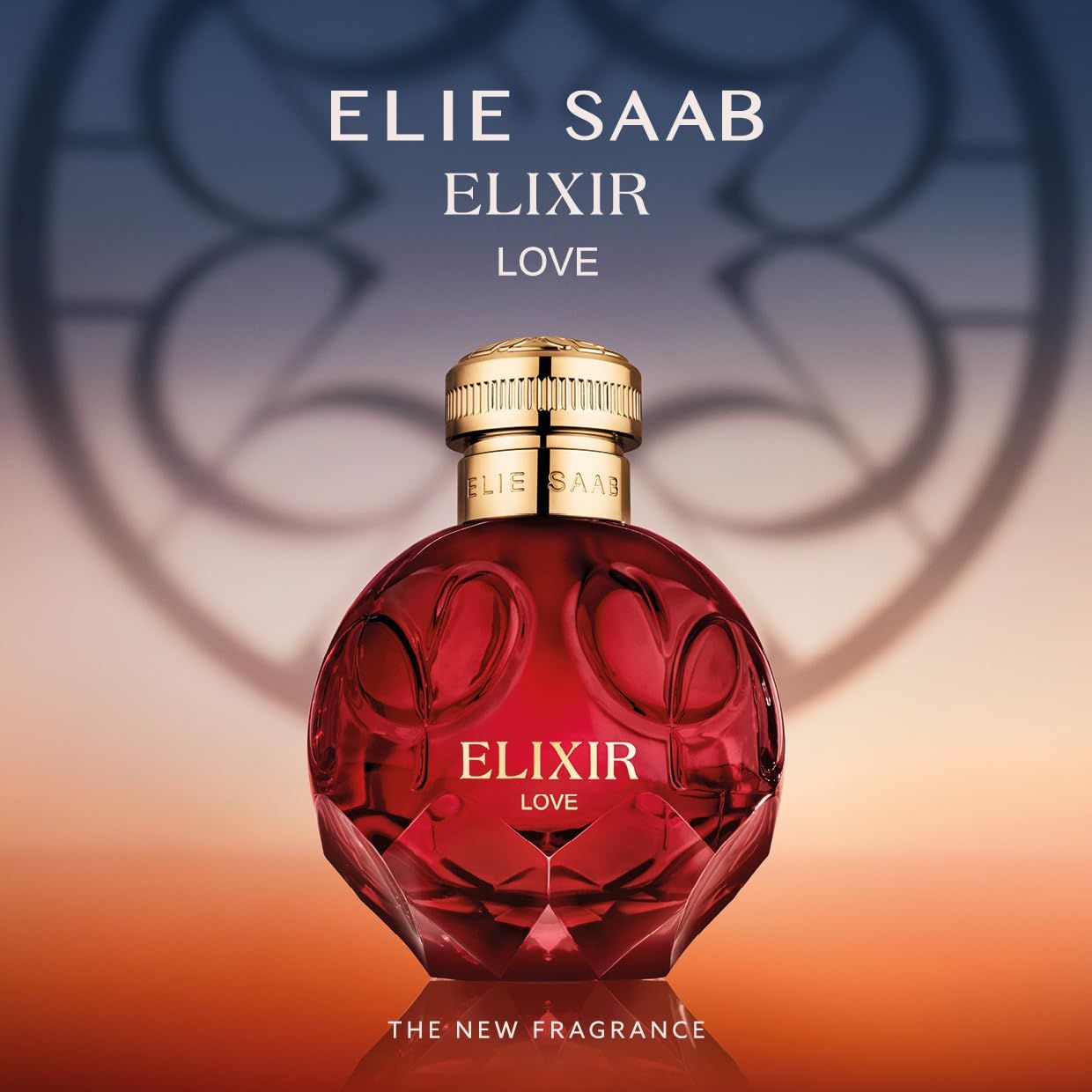 ELIE SAAB ELIXIR LOVE Eau de Parfum Flakon. Runder, roter Flakon mit goldenem Verschluss. Aufschrift: ELIXIR LOVE.