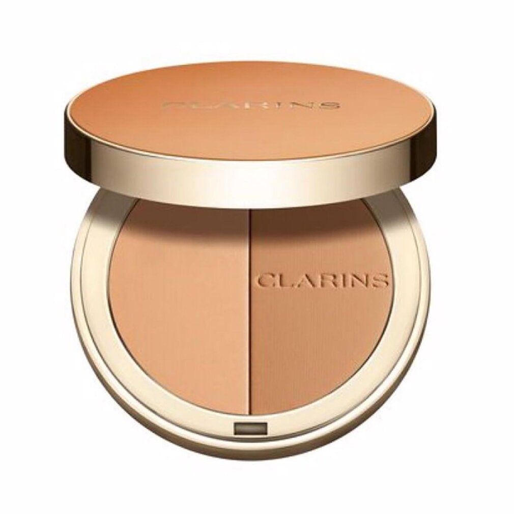 Runder Bronzer-Kompaktpuder, geöffnet. Zwei Farbtöne, goldfarbener Deckel mit Schriftzug. Marke: CLARINS.