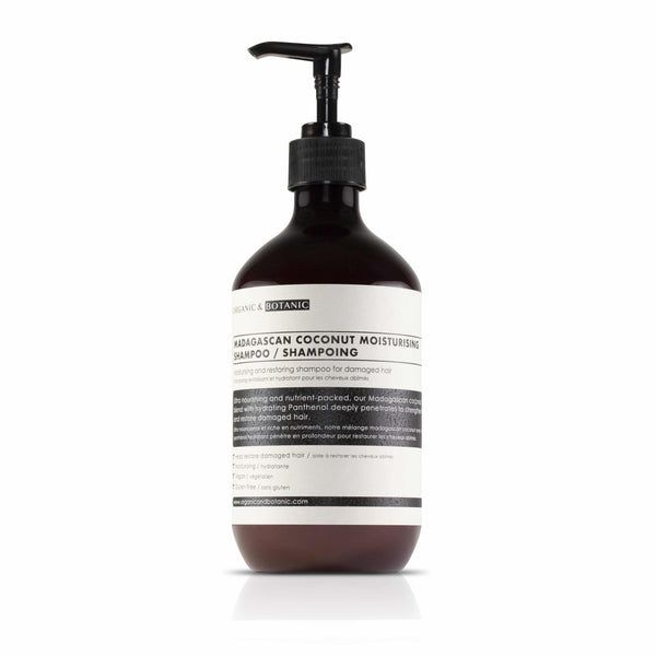 Braune Flasche mit schwarzem Pumpkopf. Aufkleber mit Text: Madagascan Coconut Moisturising Shampoo. Marke: Organic & Botanic.