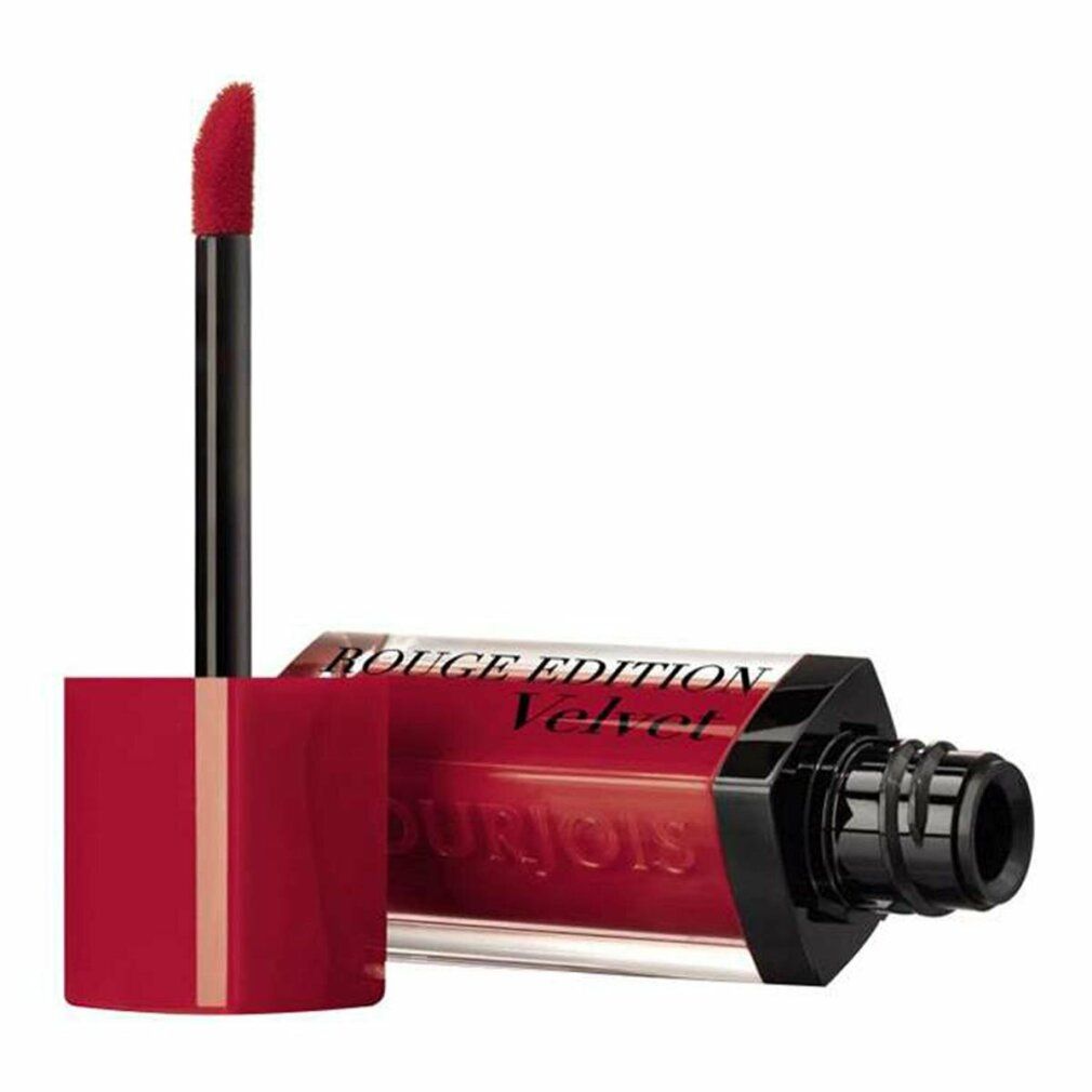 Roter Lippenstift mit Applikator. Flasche liegt. Schwarzer Applikator. Aufschrift: Rouge Edition Velvet.