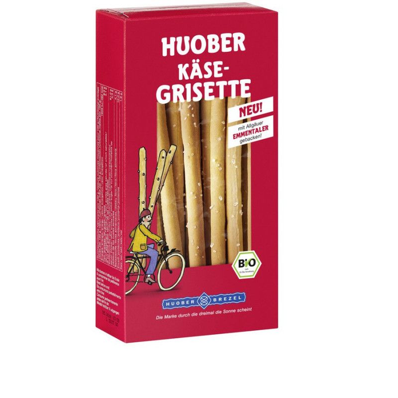 Rote Verpackung mit Huober Käse-Grisette. Bio-Siegel. Aufschrift "Neu!". Abbildung von Brotstangen und Radfahrer.