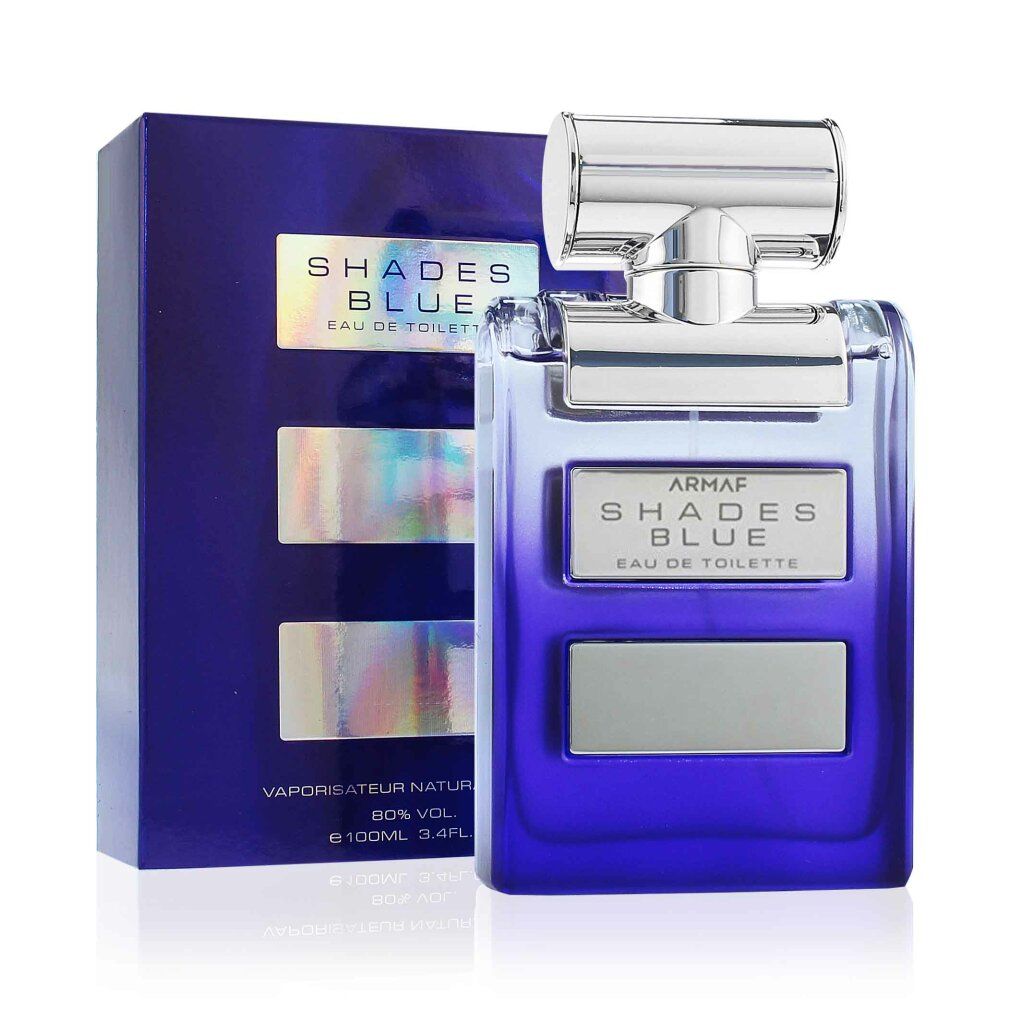 Blaues Eau de Toilette Spray mit Verpackung. Aufschrift: SHADES BLUE, EAU DE TOILETTE. Flakon und Verpackung in Blau.