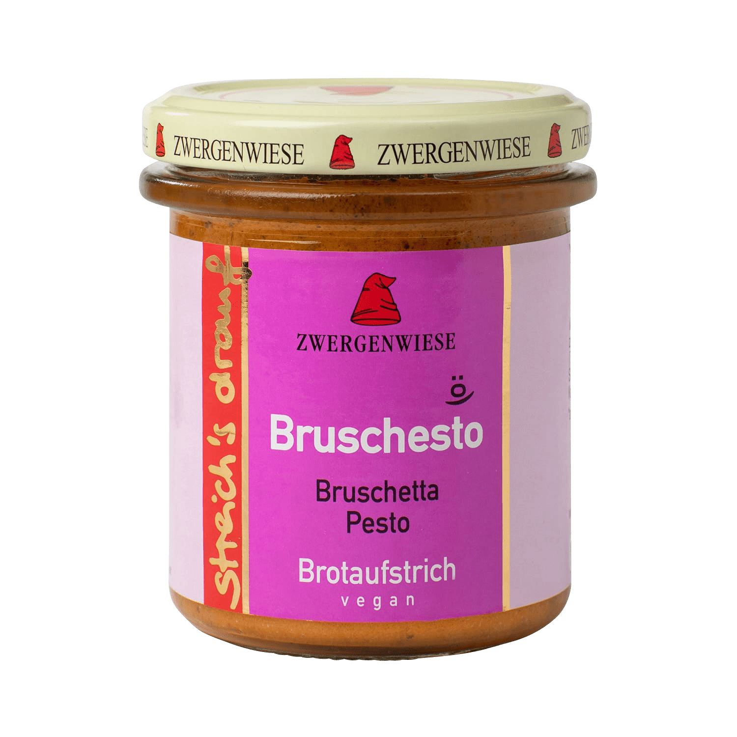 Glas mit Bruschesto-Aufstrich. Rosa Etikett mit Text: Zwergenwiese, Bruschesto, Bruschetta Pesto, Brotaufstrich, vegan. Deckel mit Logo.
