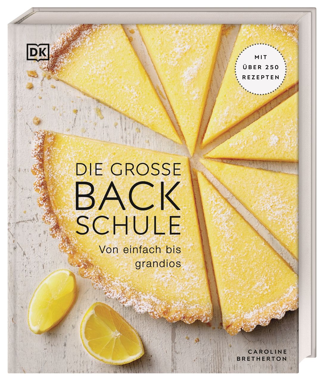Buch "Die große Backschule" mit Zitronenkuchen. Titel und Autor sichtbar. DK-Logo.