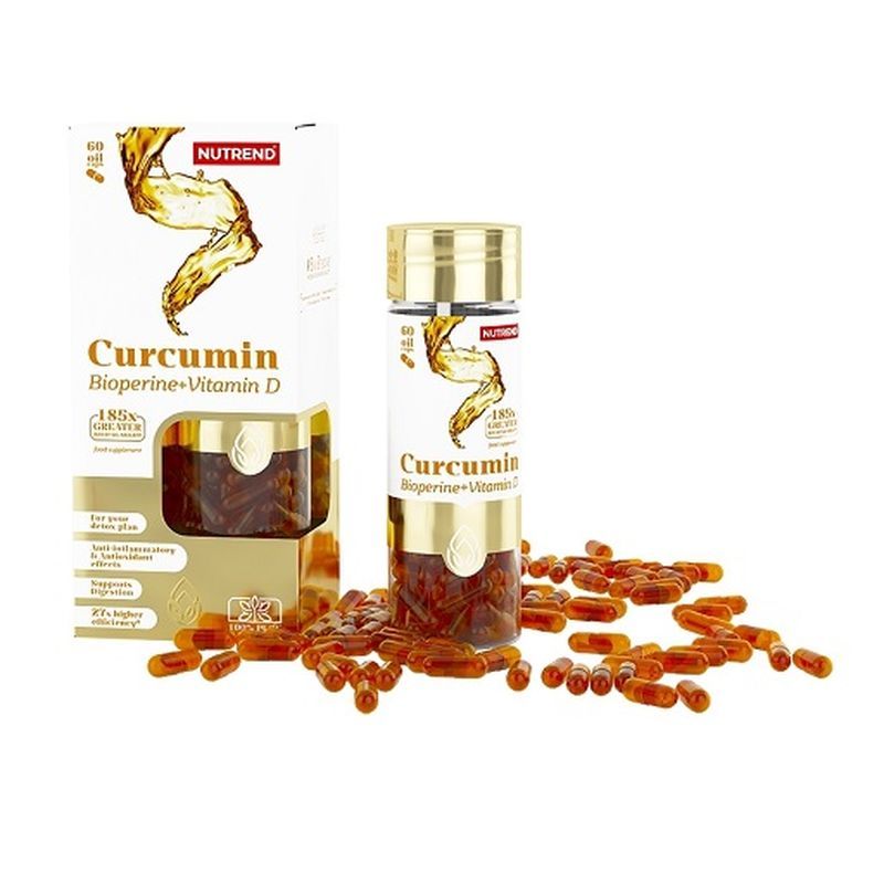 Nahrungsergänzungsmittel. Kapseln und Verpackung mit Produktnamen und Marke. Goldfarbene Kapseln liegen verstreut.