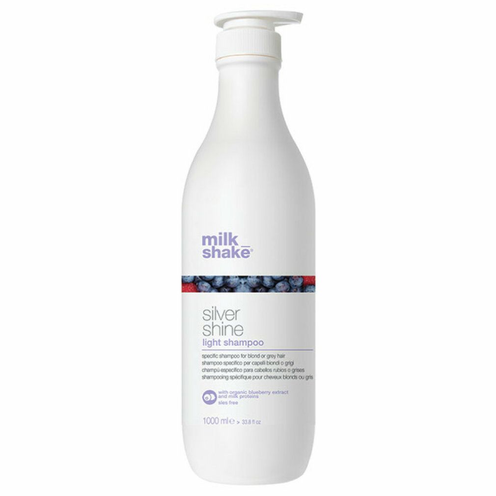 Weiße Flasche mit Pumpverschluss. Aufschrift: milk_shake, silver shine light shampoo. 1000 ml.