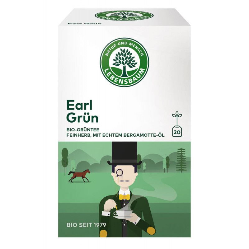Verpackung von Earl Grün Tee. Logo mit Baum und Schriftzug. Aufschrift: BIO-GRÜNTEE, FEINHERB, MIT ECHTEM BERGAMOTTE-ÖL. Illustration eines Mannes mit Hut und Tasse.