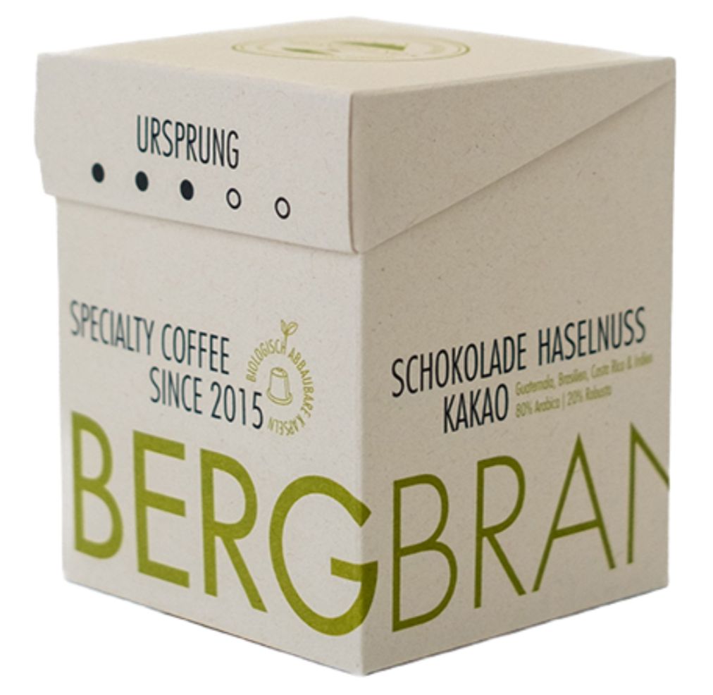Kaffeepackung. BERGBRAND Specialty Coffee. Schokolade Haselnuss Kakao. Ursprung, seit 2015.