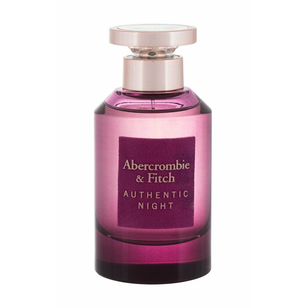 Abercrombie & Fitch Authentic Night Flakon. Lila Glasflakon mit goldfarbenem Verschluss. Rechteckiges Etikett mit Text.