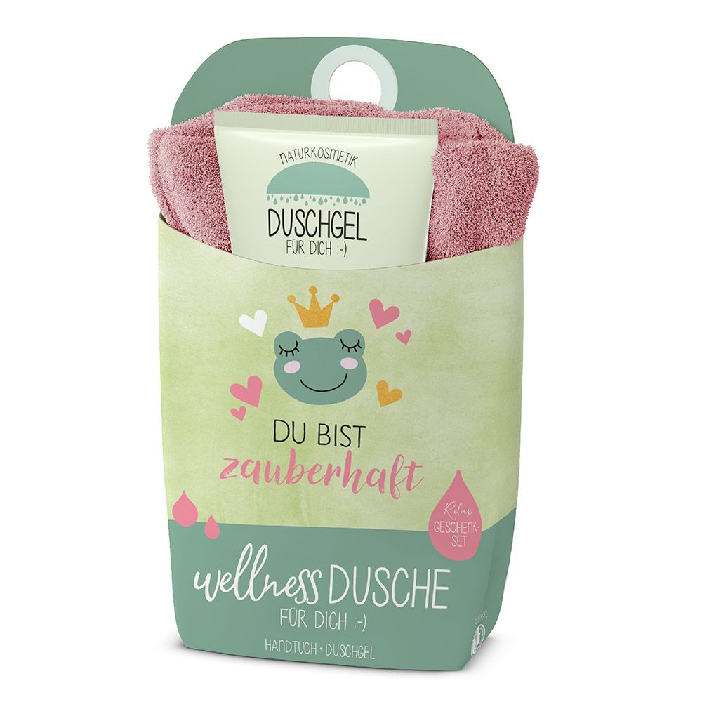 Coffret cadeau douche bien-être. Contient une serviette et un gel douche. Emballage avec illustration de grenouille et texte "Du bist zauberhaft".