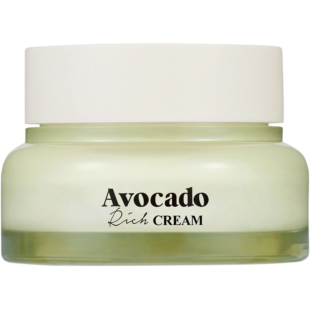 Cremebehälter mit weißem Deckel. Aufschrift: Avocado Rich CREAM. Grüner Inhalt sichtbar.