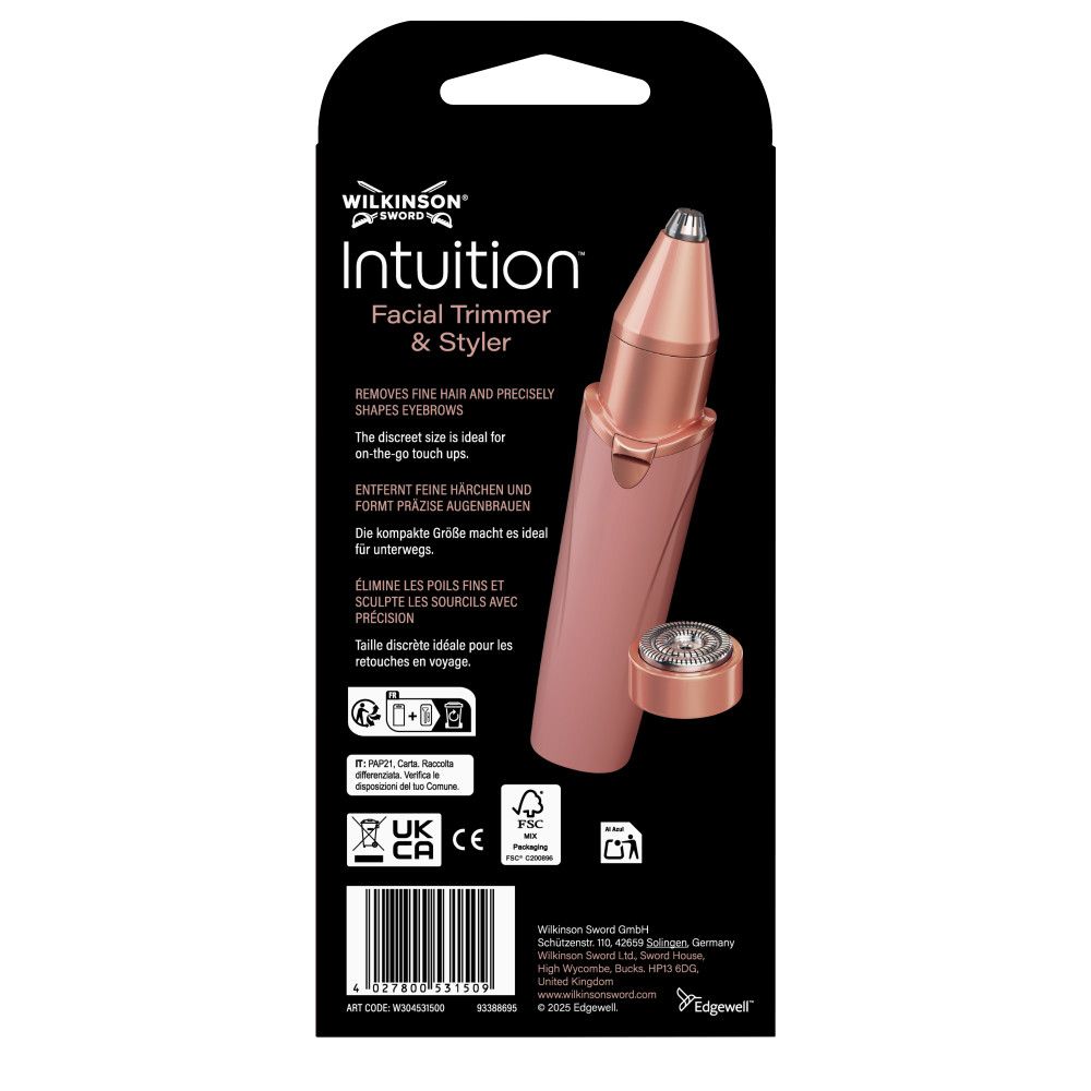 Rosafarbener Gesichts-Trimmer und Styler mit silberner Spitze und abnehmbarem Aufsatz. Verpackung mit Produktinformationen.