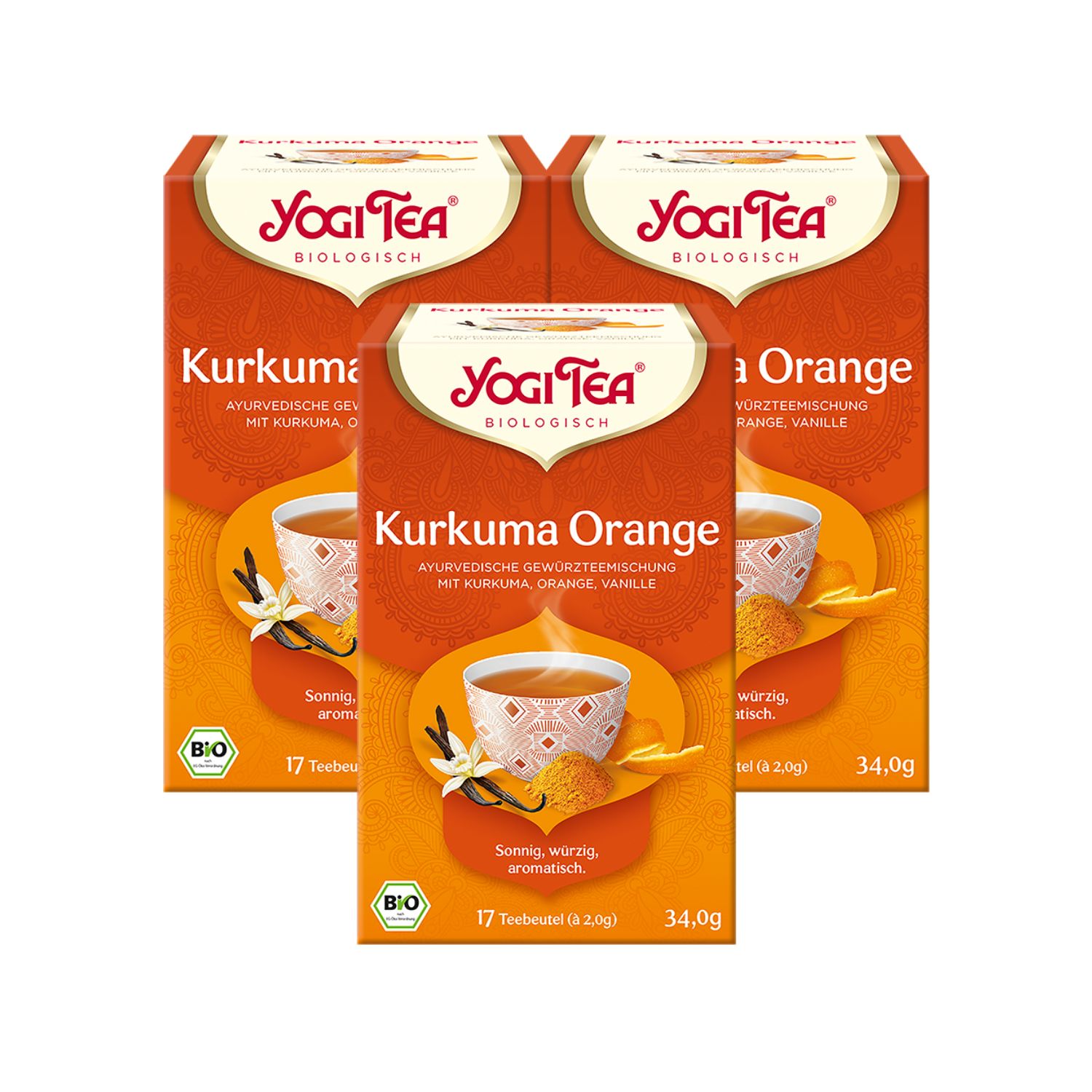 Mehrere Packungen Tee, Kurkuma Orange Bio Gewürztee, mit Logo und Produktinformationen. Bio-Siegel.